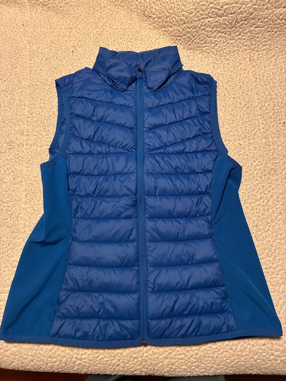 Sweaty Betty Blue Quilted Stretch-Side Vest, size 12, has hood
